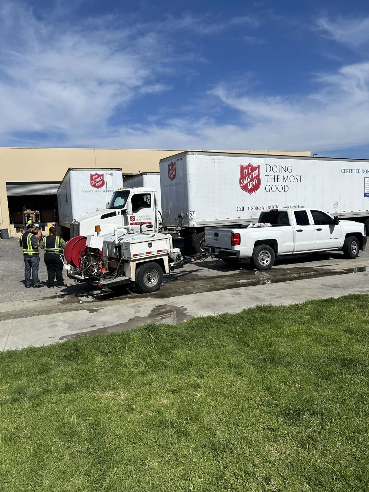 SpeeDee Drains commercial hydro-jetter truck servicing a Salvation Army warehouse in Fullerton, CA