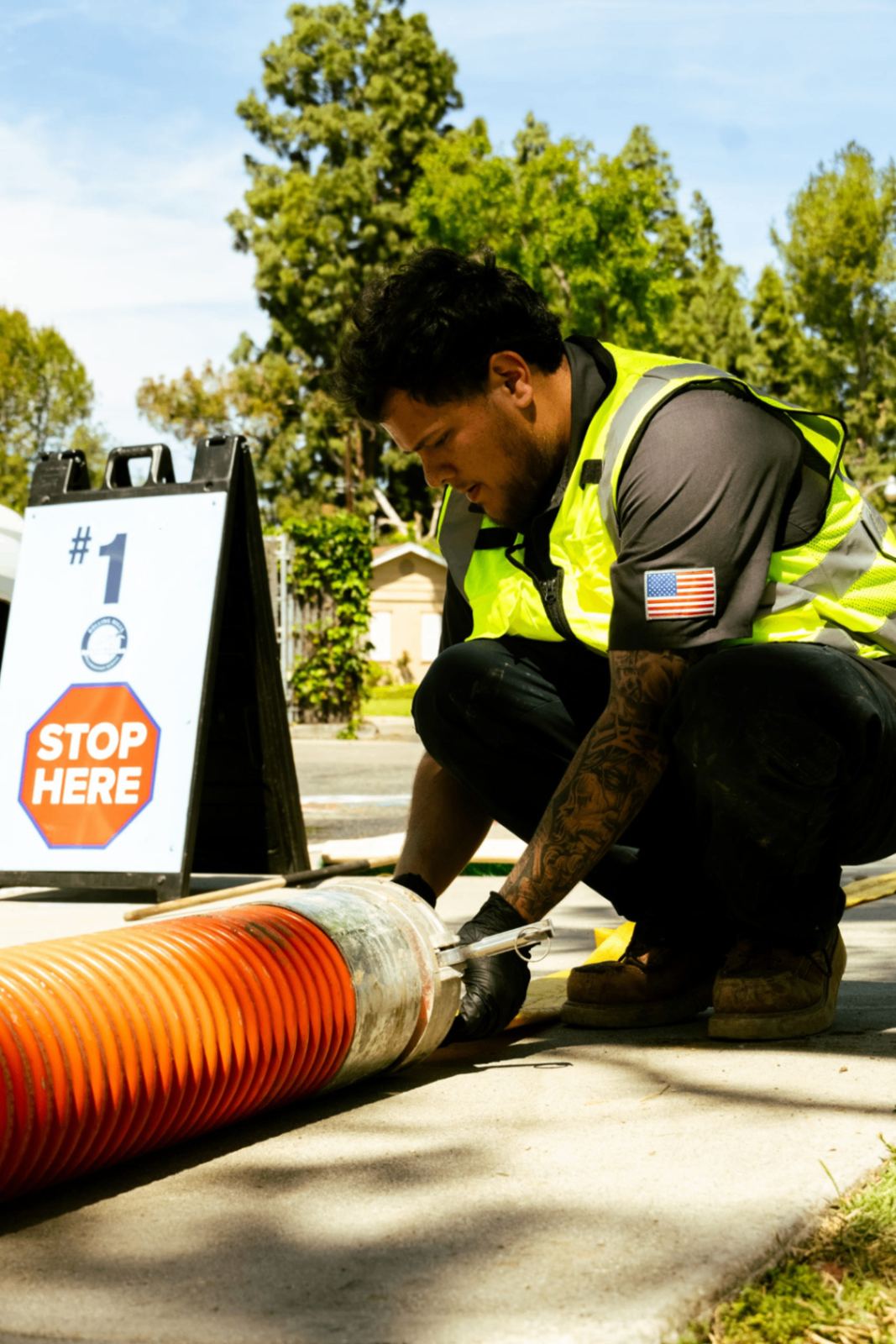 SpeeDee Drains technician securing pipe prep equipment before a trenchless installation in Orange County, CA
