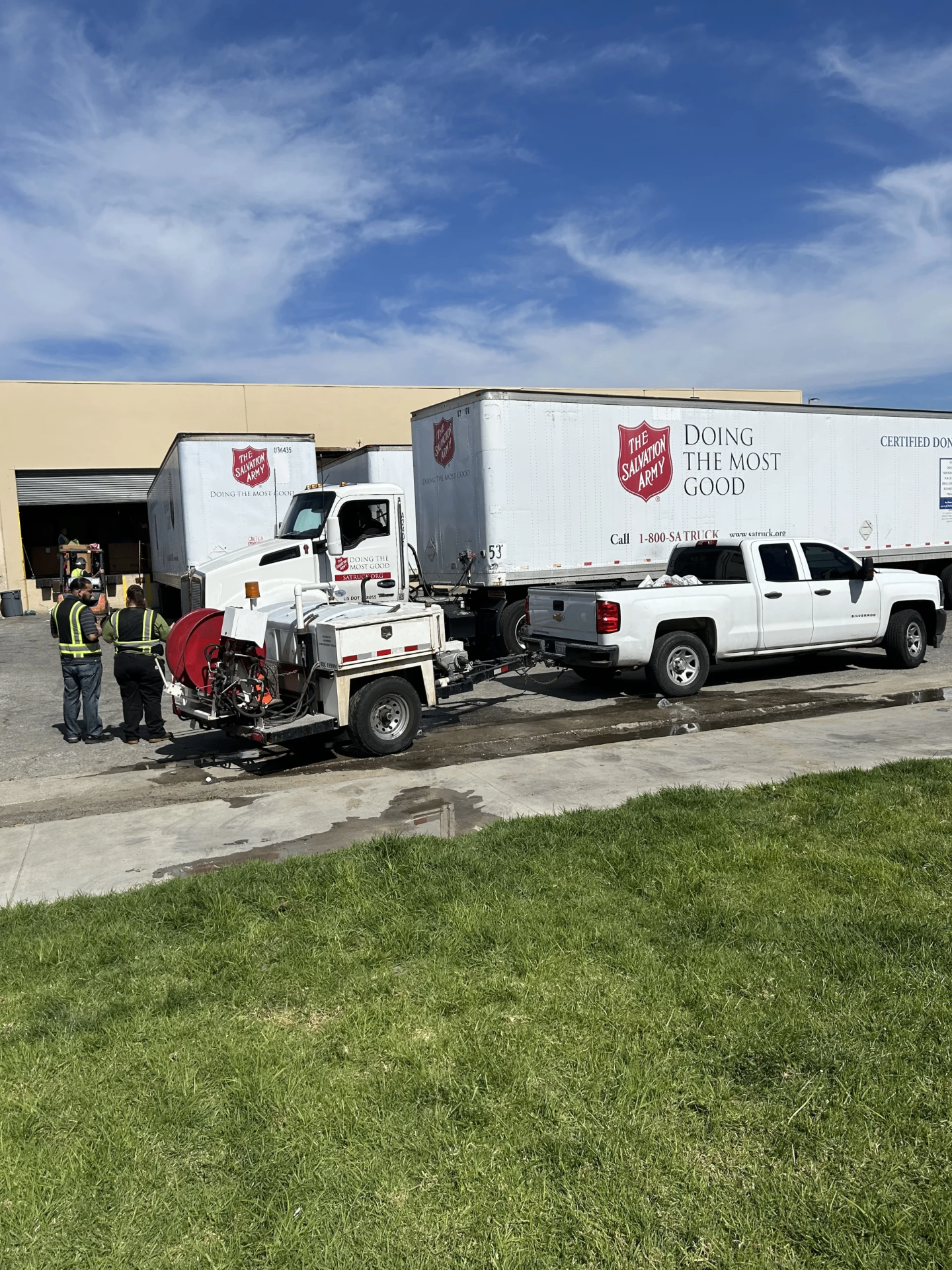SpeeDee Drains commercial hydro-jetter truck servicing a Salvation Army warehouse in Fullerton, CA