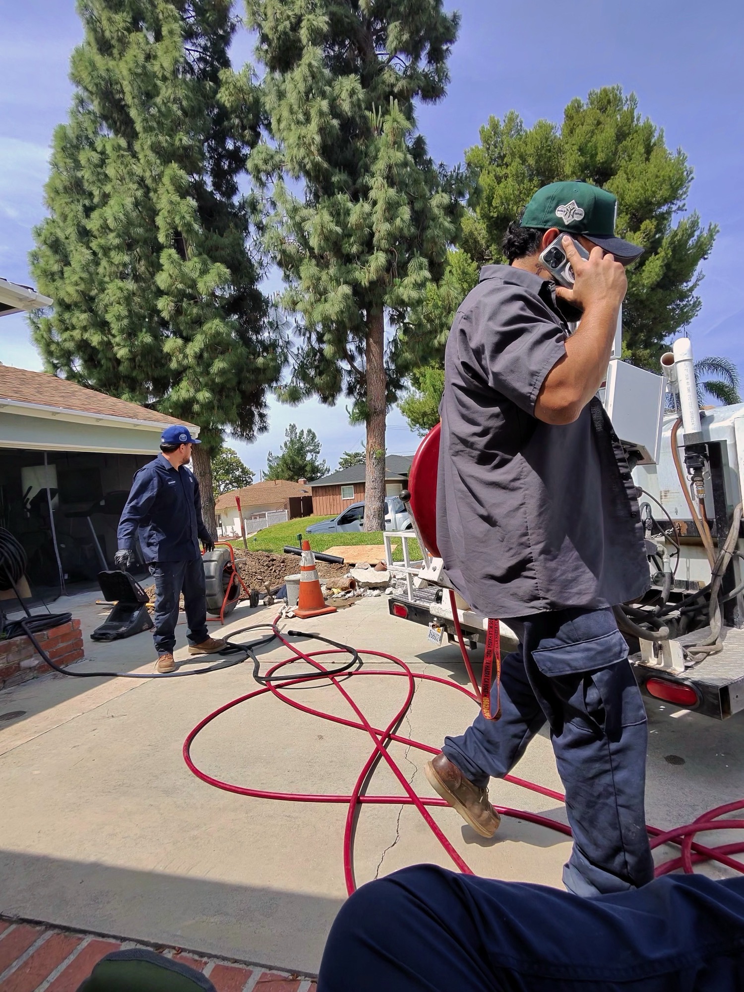 Speedee Drains technician setting up the hydro jet truck