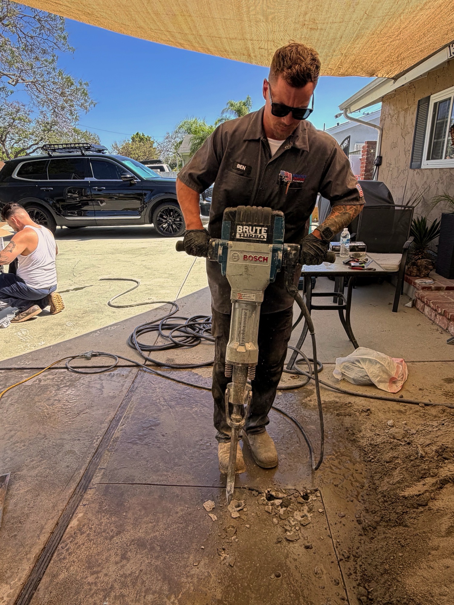 Concrete slab excavation and repair